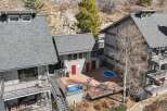 Discover a luxurious retreat with this stunning property, featuring a private hot tub and a refreshing pool.