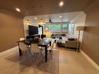 Step into this inviting living space, perfect for both relaxation and entertaining.