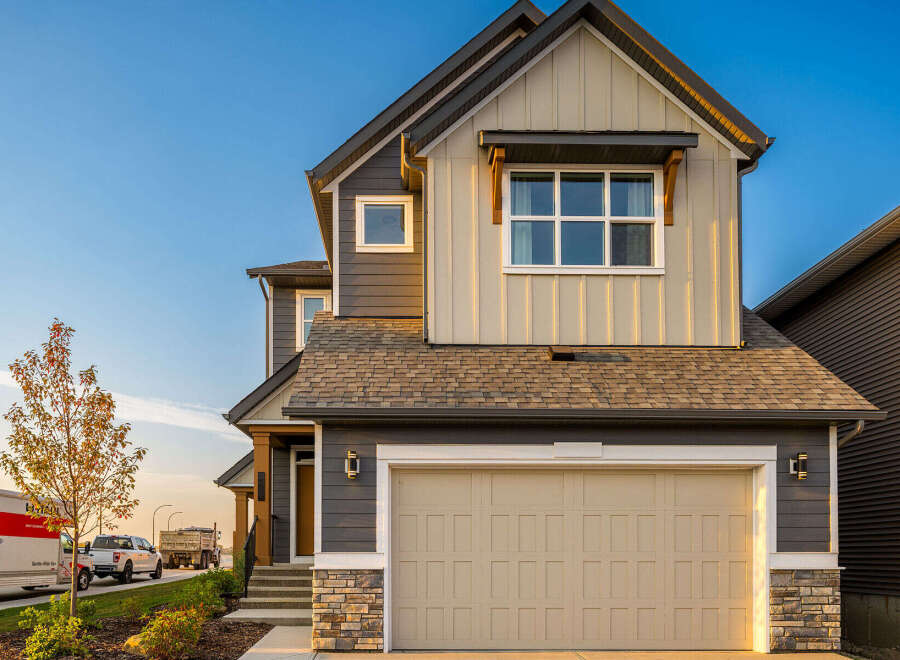 This stunning two-story home boasts a modern design with a neutral color palette.