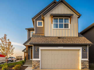 This stunning two-story home boasts a modern design with a neutral color palette.