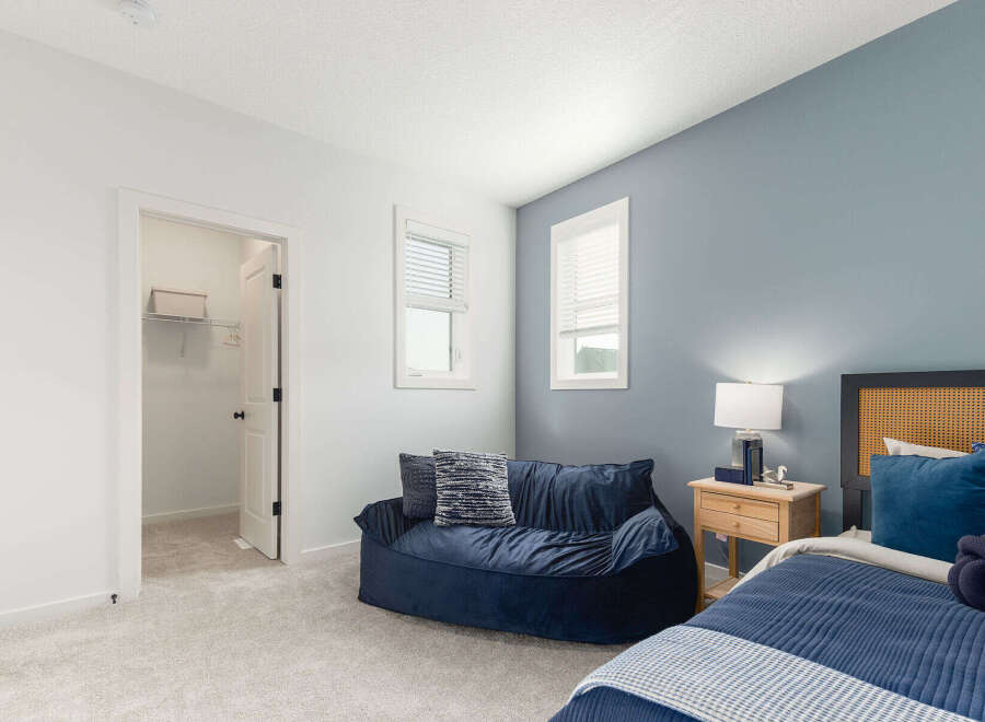 Discover the charm of this inviting bedroom, perfect for relaxation and comfort.