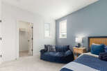 Discover the charm of this inviting bedroom, perfect for relaxation and comfort.