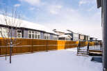 This stunning property boasts a beautiful backyard, perfect for enjoying the winter season.