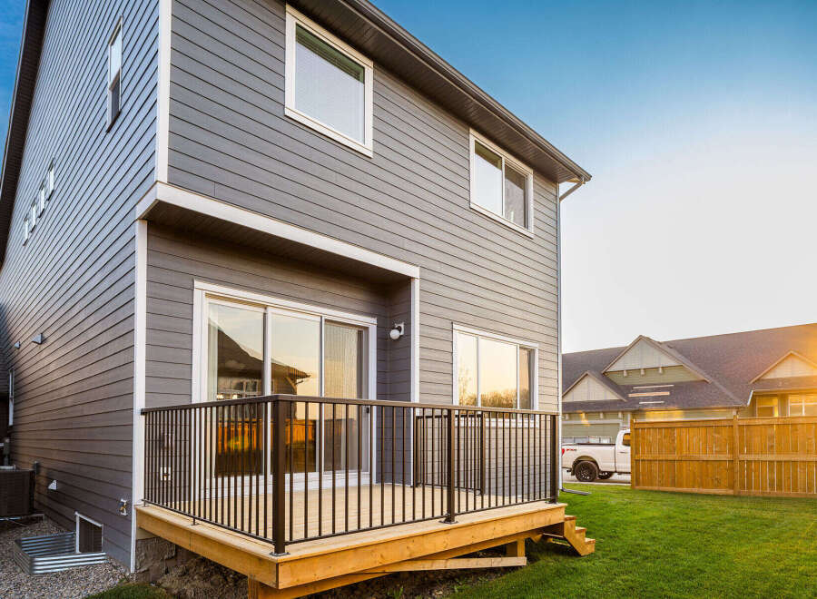 This stunning property boasts a modern design with a spacious deck, perfect for outdoor entertaining.