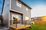 This stunning property boasts a modern design with a spacious deck, perfect for outdoor entertaining.