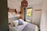 Discover the charm of this cozy bedroom, perfect for a relaxing retreat.