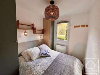 Discover the charm of this cozy bedroom, perfect for a relaxing retreat.