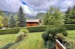 Nestled amidst lush greenery and majestic mountains, this property offers a serene escape.