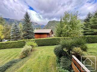 Nestled amidst lush greenery and majestic mountains, this property offers a serene escape.