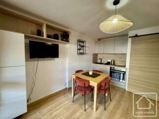 Discover this charming property featuring a modern kitchen with sleek cabinetry and appliances.
