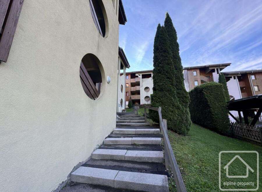 Discover this charming property featuring unique architectural details and a welcoming entrance.