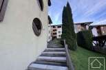 Discover this charming property featuring unique architectural details and a welcoming entrance.
