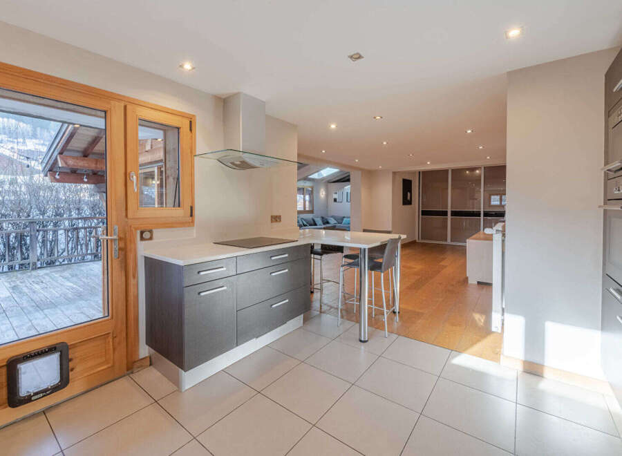 This stunning kitchen boasts modern design and functionality.