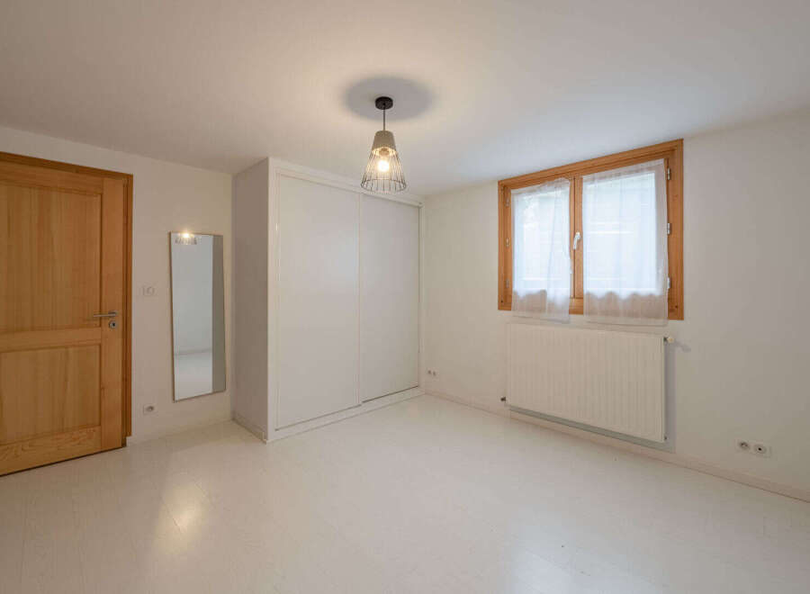 Discover this bright and airy bedroom, featuring a large closet for ample storage.