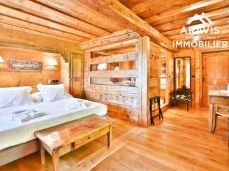 Experience rustic charm in this stunning property, featuring exquisite wooden interiors and a cozy ambiance.