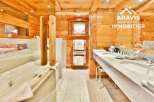 Experience luxury in this stunning bathroom featuring a jacuzzi tub and a double sink vanity.