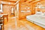 Experience the warmth of this stunning wooden chalet, perfect for a cozy retreat.