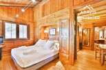Experience the warmth of this stunning wooden chalet, perfect for a cozy retreat.