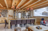 This stunning property boasts a warm and inviting interior, perfect for a cozy retreat.
