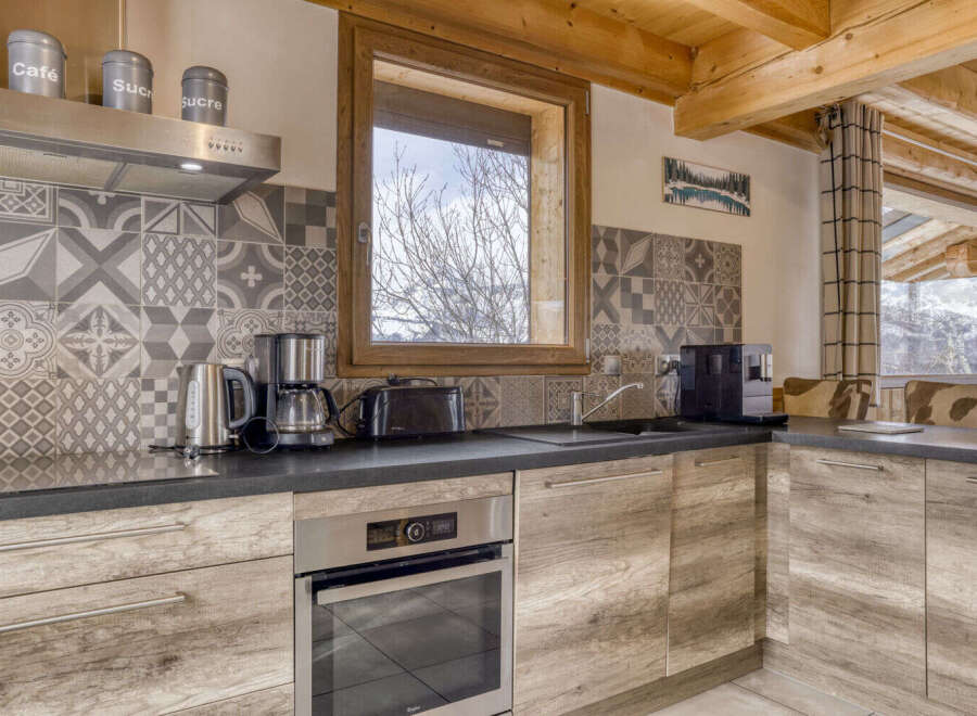 This stunning kitchen boasts a modern design with a touch of rustic charm.