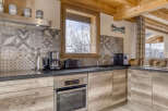 This stunning kitchen boasts a modern design with a touch of rustic charm.