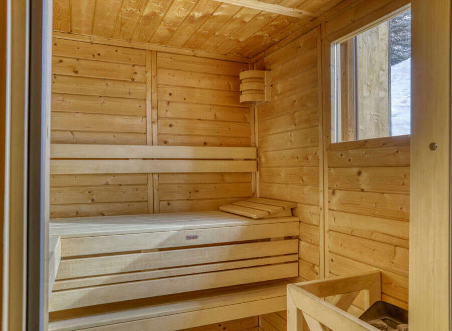 Step into relaxation with this stunning sauna.