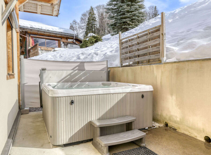 Enjoy the ultimate relaxation in this stunning property featuring a luxurious hot tub.