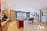 Discover this stunning property featuring a modern kitchen with an island, perfect for culinary enthusiasts.