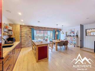 Discover this stunning property featuring a modern kitchen with an island, perfect for culinary enthusiasts.