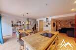 This stunning property boasts a modern open-plan living space, perfect for entertaining.