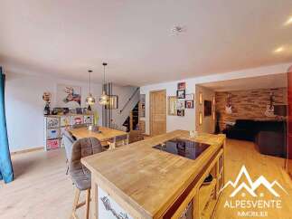 This stunning property boasts a modern open-plan living space, perfect for entertaining.
