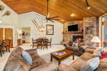 This stunning living room boasts a cozy fireplace, perfect for chilly evenings.