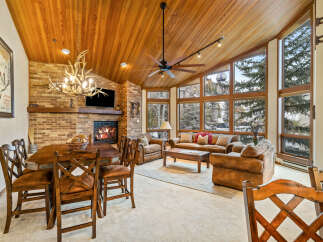 Step into luxury with this stunning property featuring a cozy fireplace, perfect for chilly evenings.