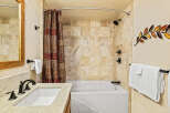 Step into a luxurious bathroom featuring a modern design and elegant finishes.