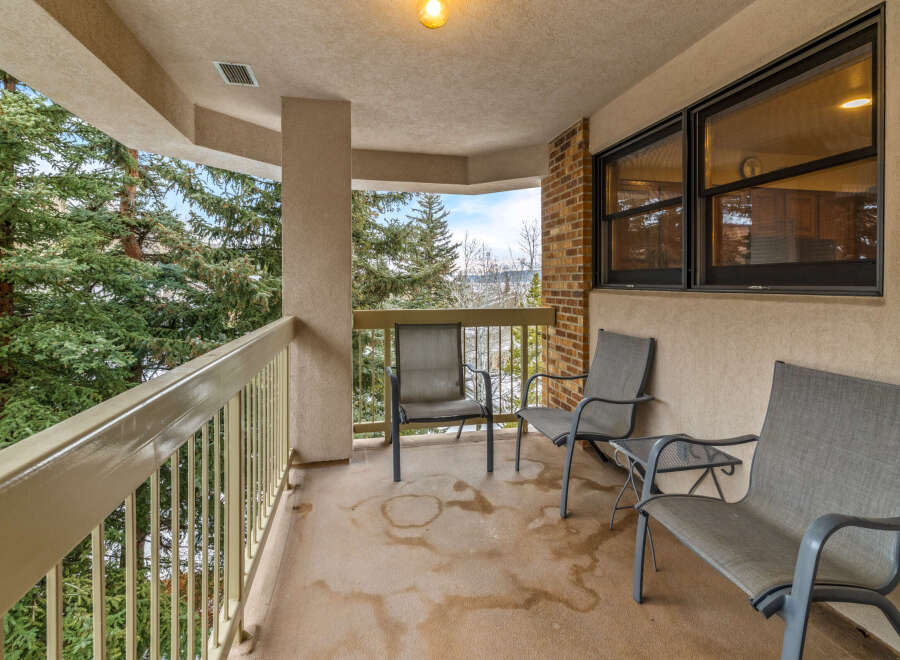 Enjoy breathtaking views from this charming balcony.