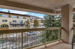 Enjoy stunning views from this beautiful balcony overlooking a serene winter landscape.