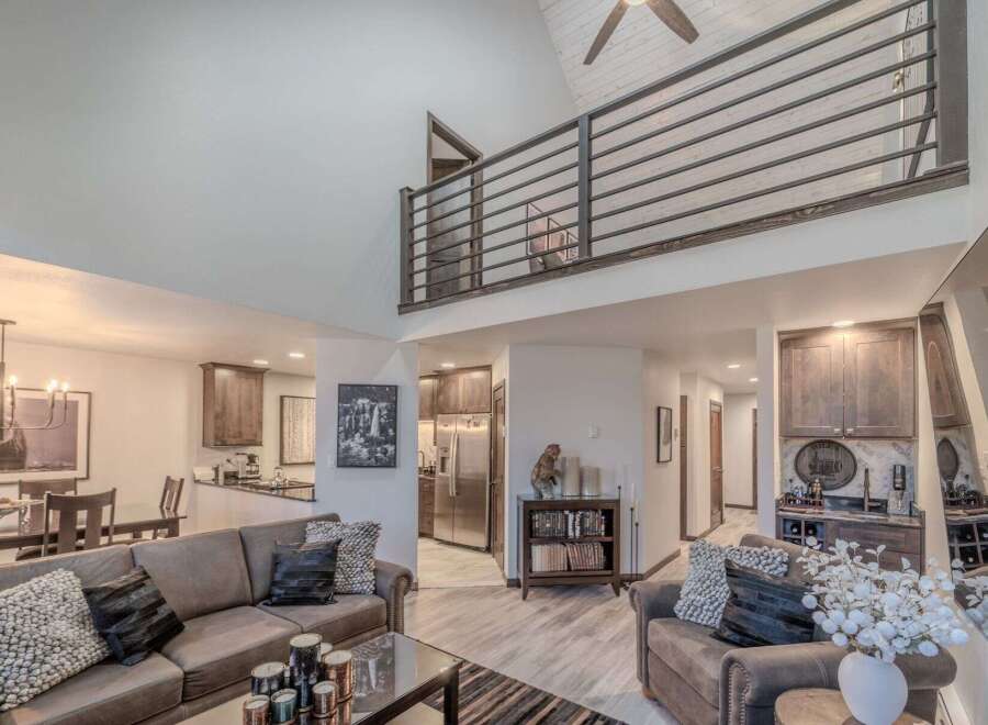 Discover the epitome of modern living in this stunning property, boasting a spacious open floor plan and soaring ceilings.