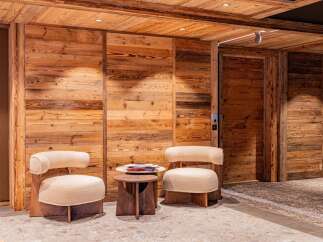 This stunning property boasts exquisite wooden paneling throughout, creating a warm and inviting atmosphere.