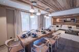Experience luxury living in this stunning property, featuring a beautifully designed dining area.