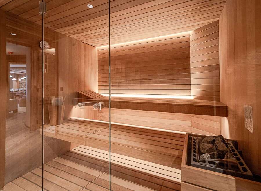 Step into luxury with this stunning sauna, a perfect addition to any high-end property.
