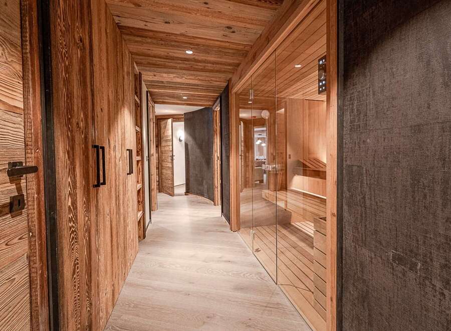 Step into luxury with this stunning property featuring exquisite wooden accents throughout.