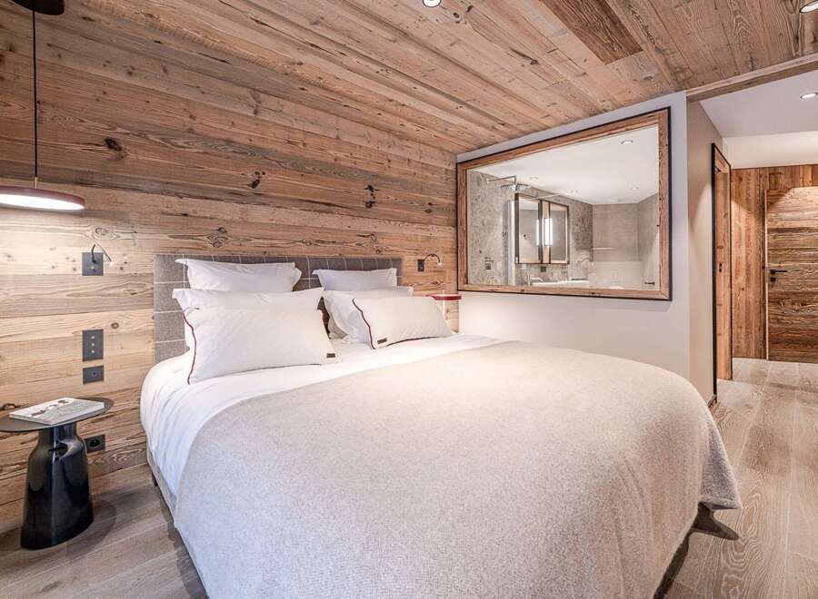 Experience rustic elegance in this stunning bedroom.