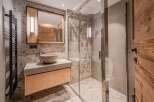 Experience luxury in this stunning bathroom featuring a modern design and high-end finishes.