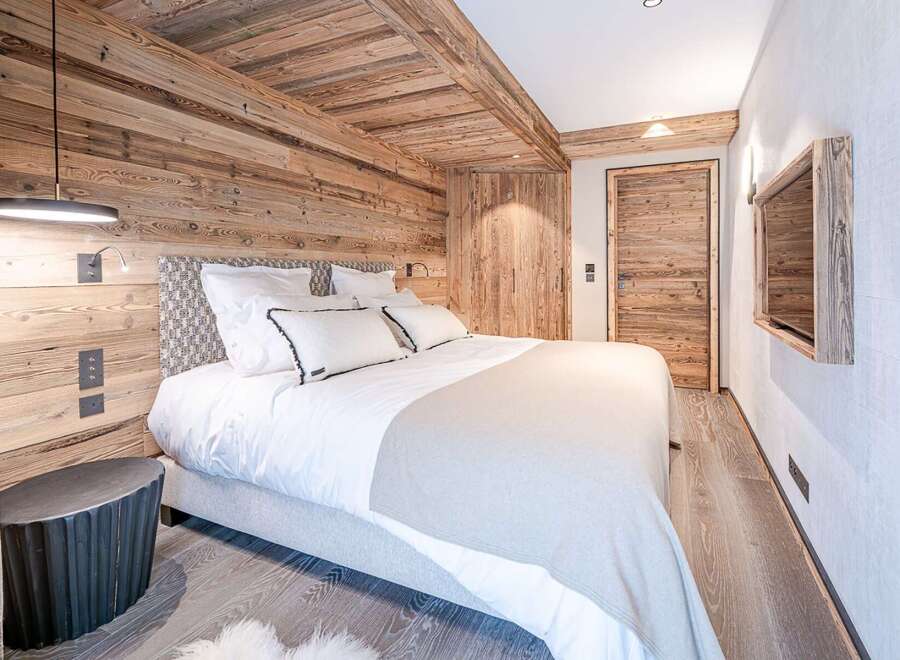 Experience rustic elegance in this stunning bedroom.