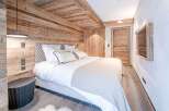 Experience rustic elegance in this stunning bedroom.