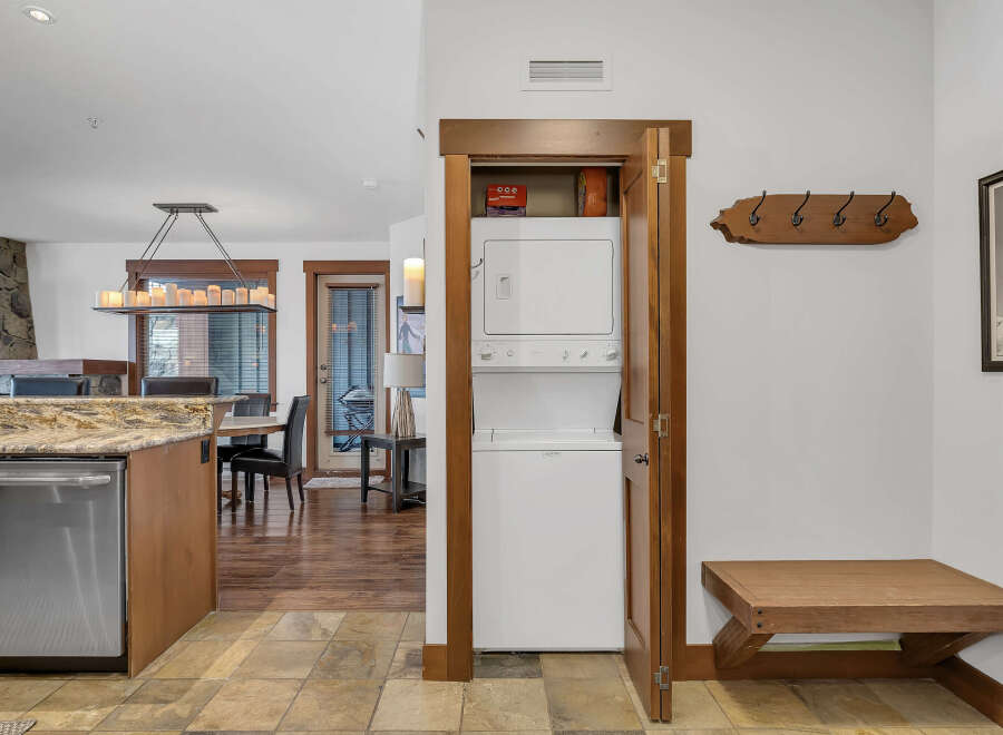 Step into this beautifully designed home featuring a modern kitchen with stainless steel appliances and a spacious layout.
