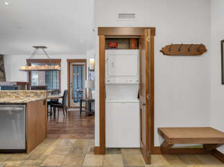 Step into this beautifully designed home featuring a modern kitchen with stainless steel appliances and a spacious layout.