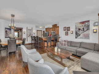 This stunning property boasts a spacious open-concept living area, perfect for entertaining.