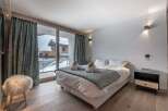 Experience luxury and comfort in this stunning bedroom.