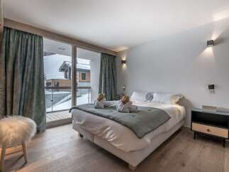 Experience luxury and comfort in this stunning bedroom.